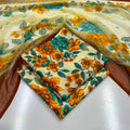 lawn 3 piece suit featuring orange and yellow flowers with teal-blue leaves 