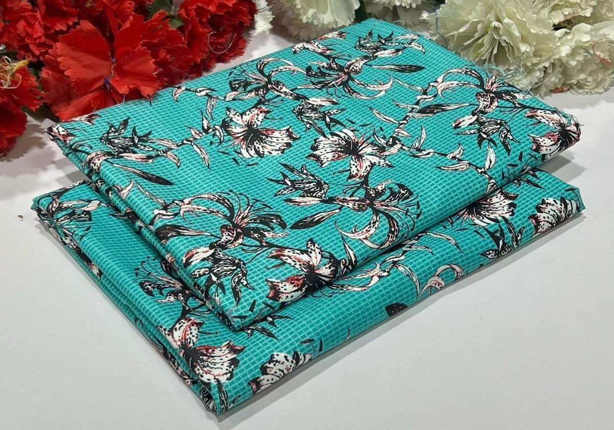 2 piece suit in blue with black floral-patterned
