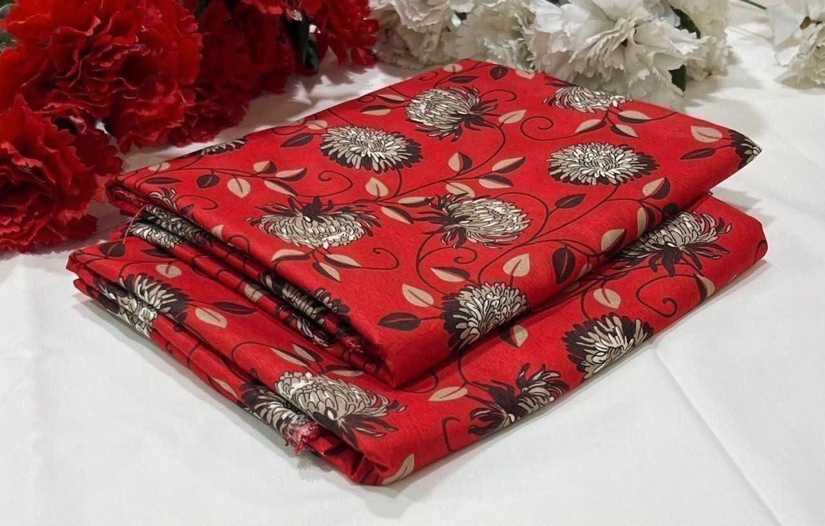 2 piece suit in red fabric with a floral and vine pattern in beige,black