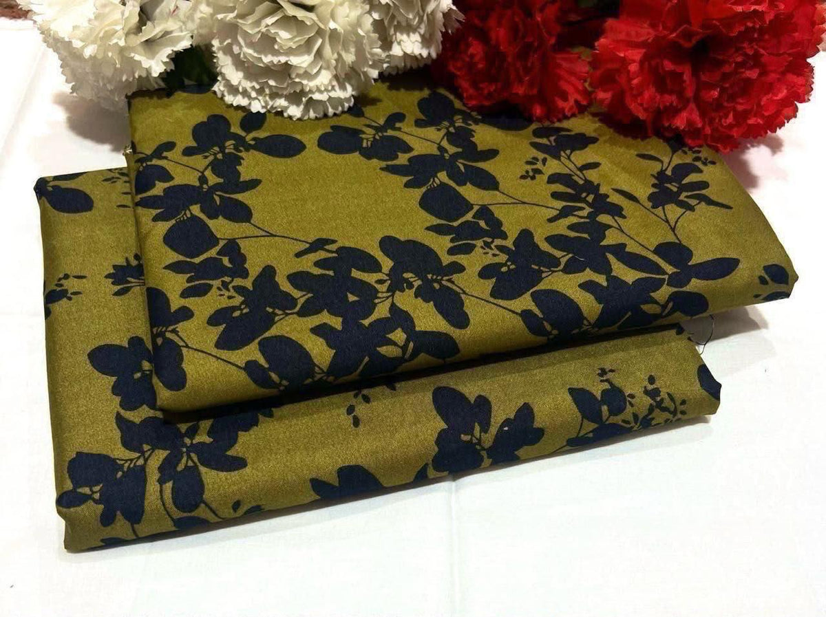 2 piece suit in green with black floral pattern