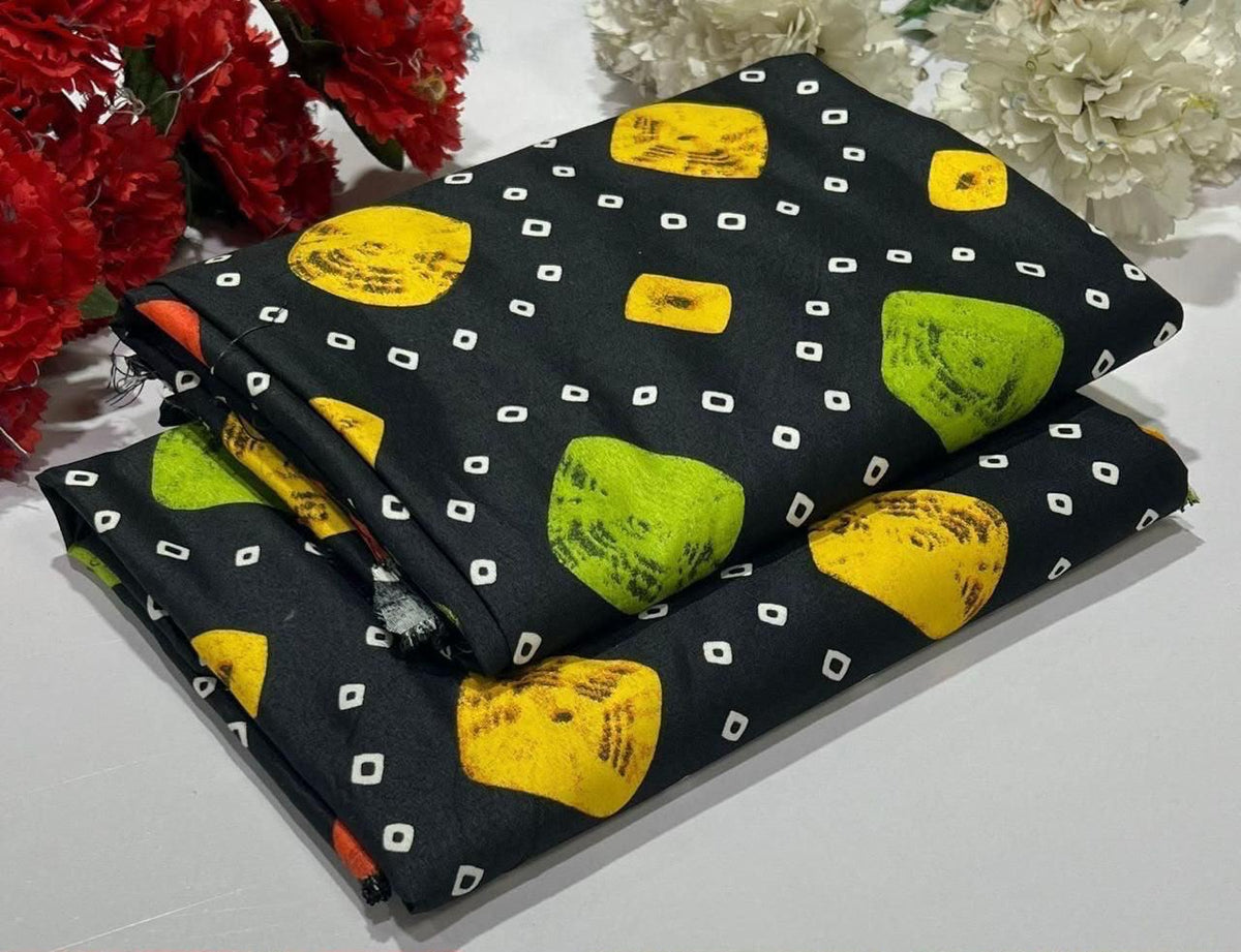 2 piece suit in black with a white dotted, yellow and green diamond pattern 
