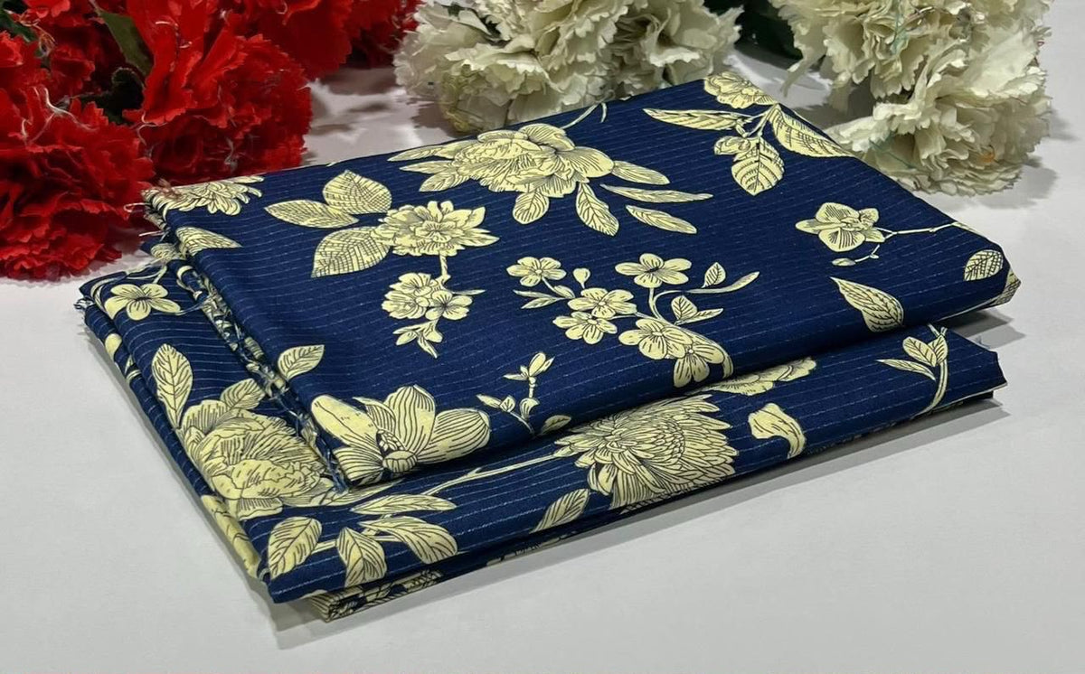 2 piece suit in blue swatches with gold floral patterns
