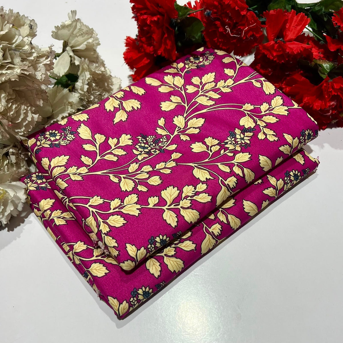 2 piece suit in pink with cream floral pattern