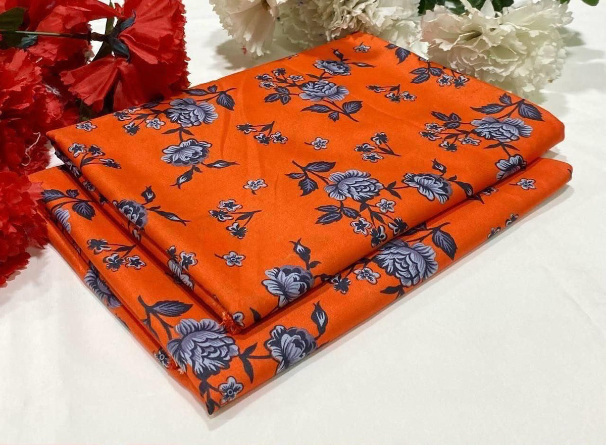 2 piece suit in Orange with black floral pattern