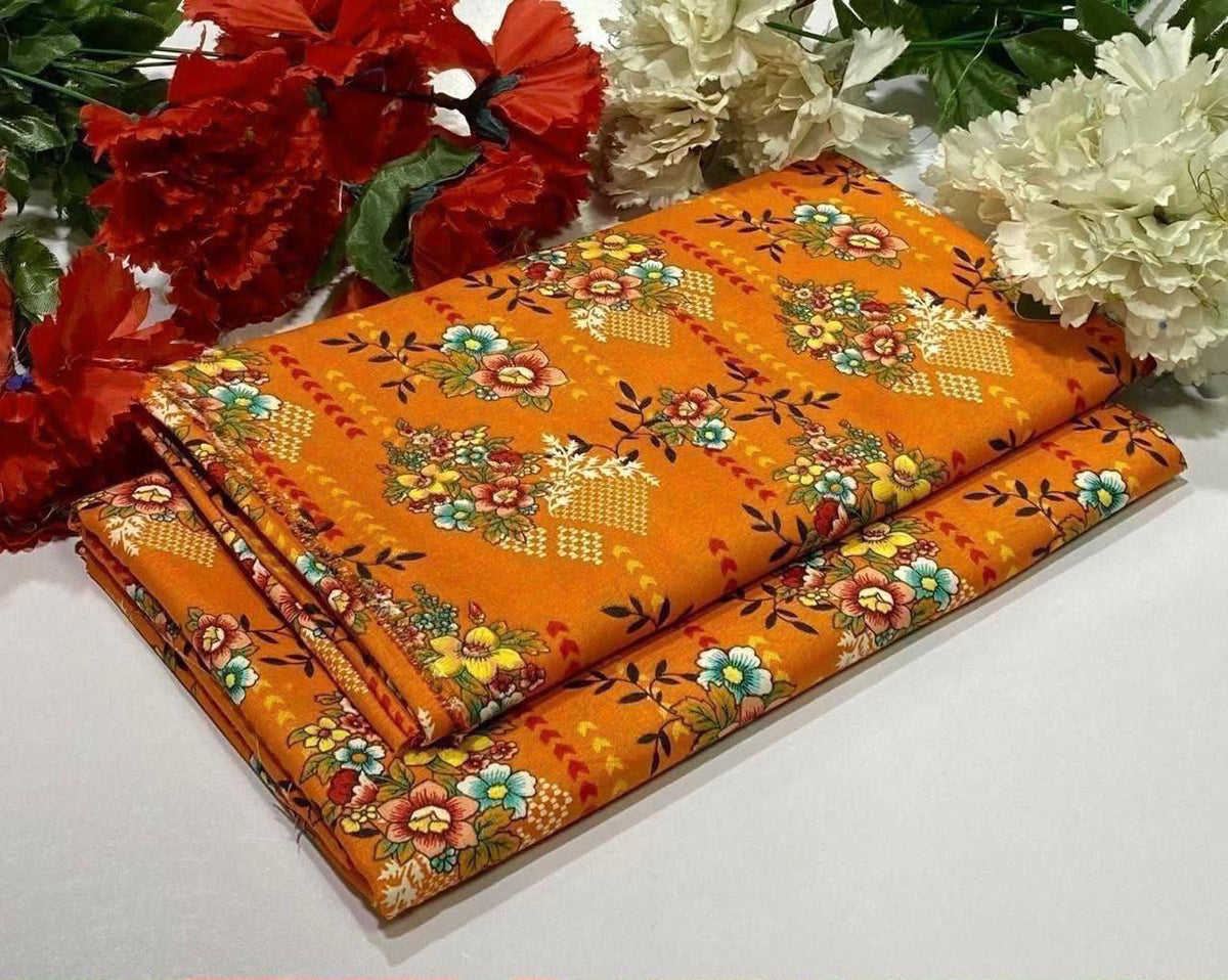 2 piece suit in orange with a colorful floral and geometric pattern