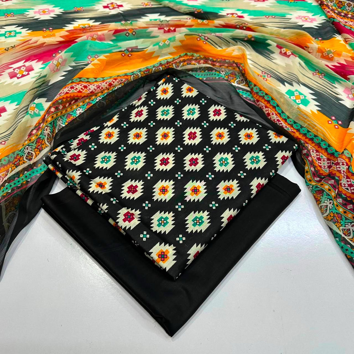 lawn 3 piece suit in black  colorful and multicolor patterned dupatta 