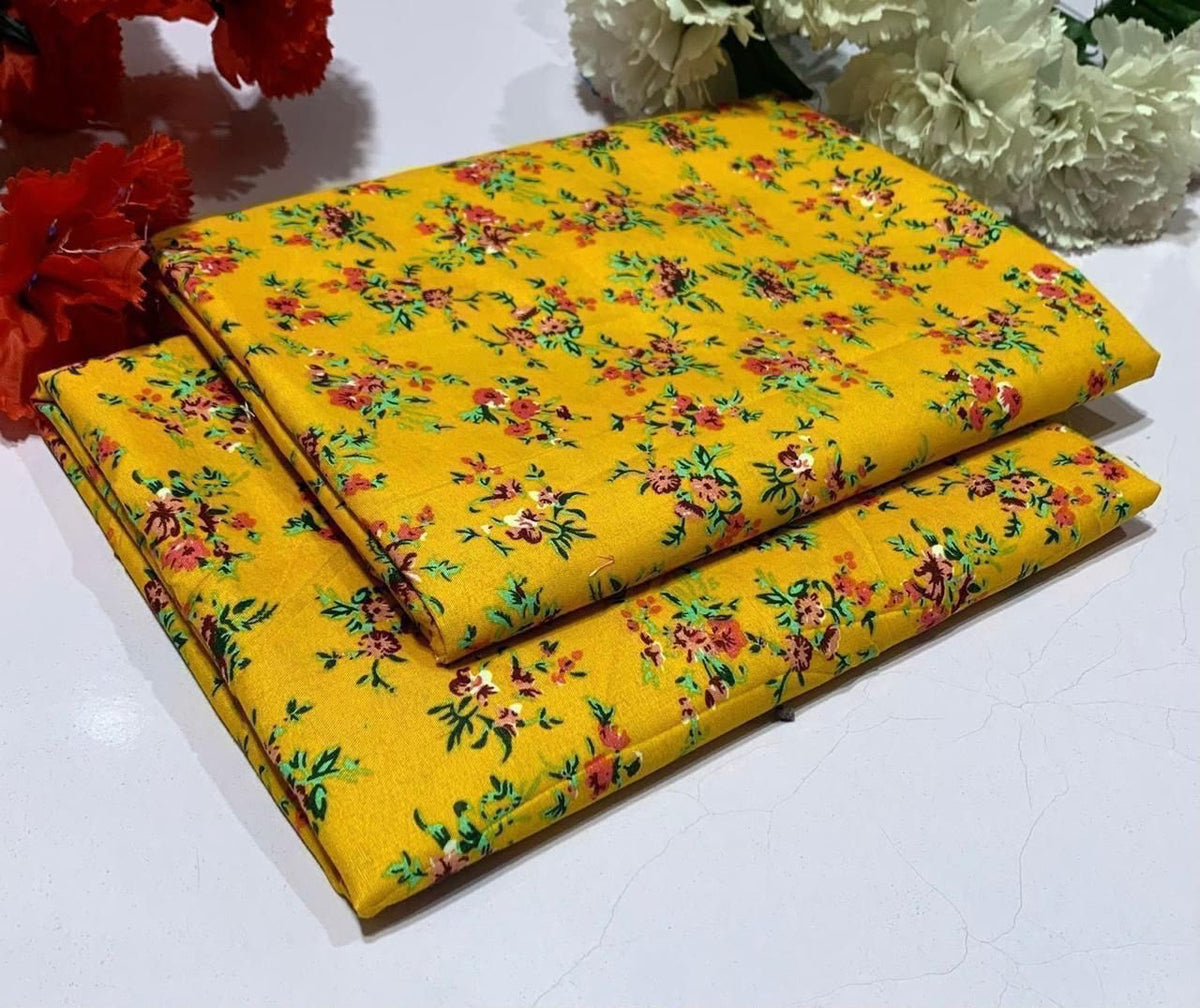 2 piece suit in yellow with red and white flowers 