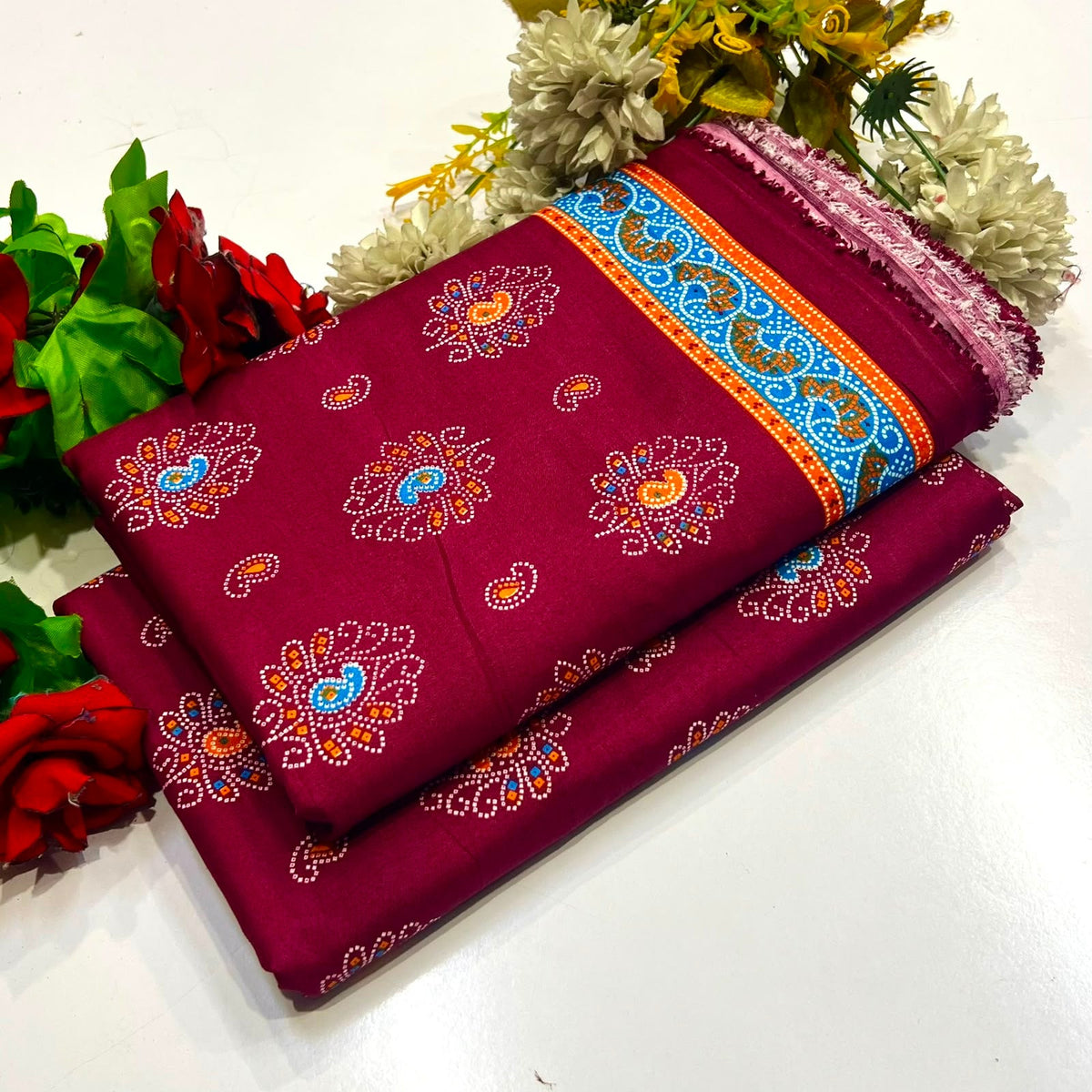  2 piece suit in deep maroon with colorful printed 