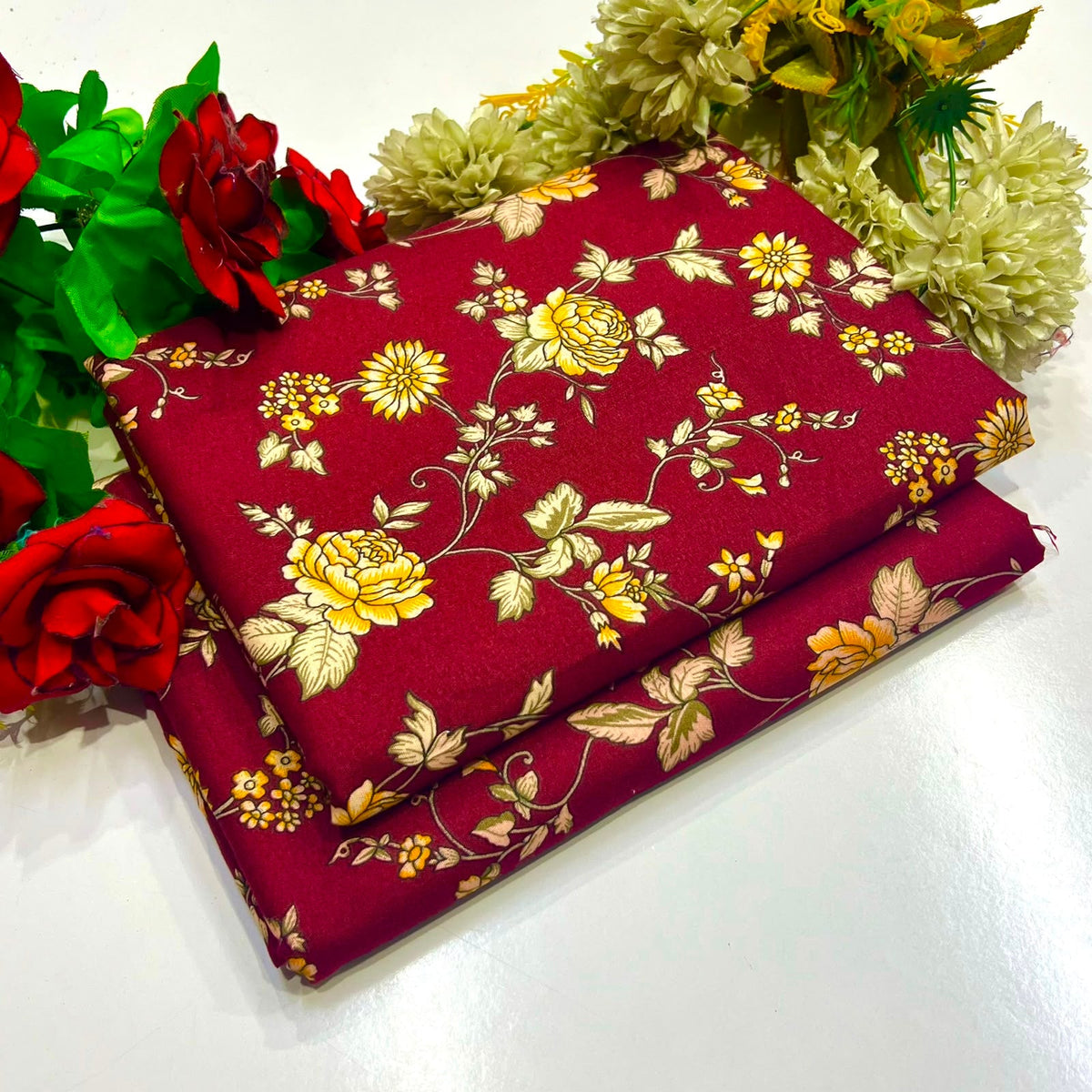 2 piece suit in  burgundy with a yellow and beige floral pattern