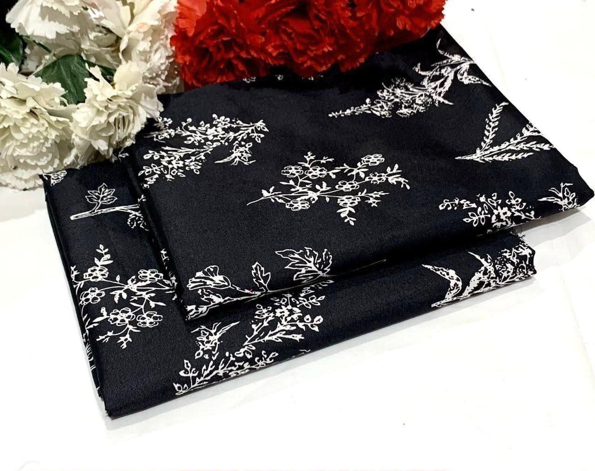 Ladies 2 piece suit in Black with white floral patterns