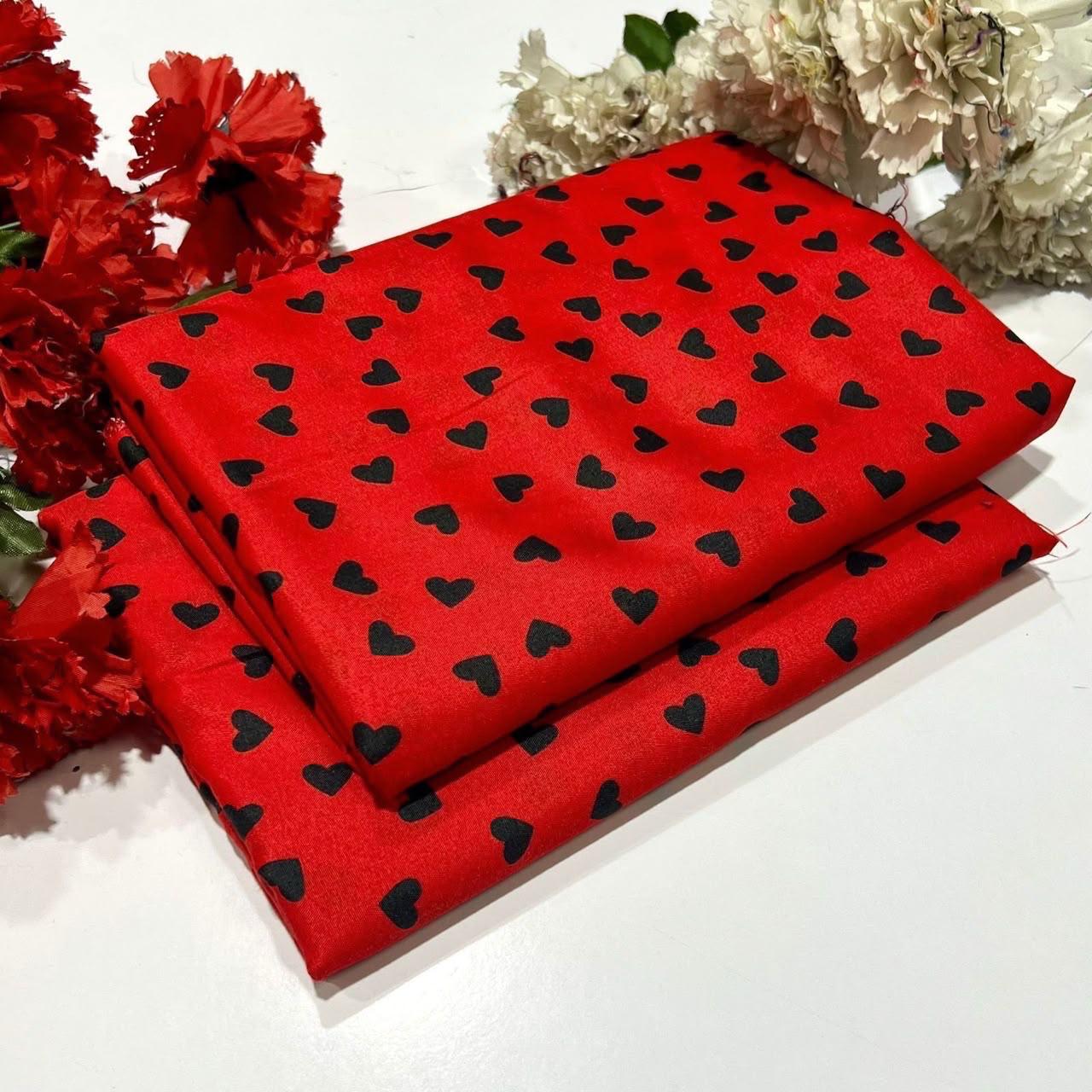 Ladies 2 piece suit in Red with black heart patterns 